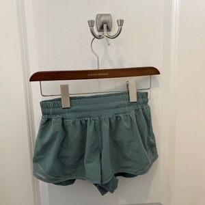 Blue green lululemon shorts. Size: 2